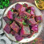 Roasted purple sweet potato recipe served with fresh parsley
