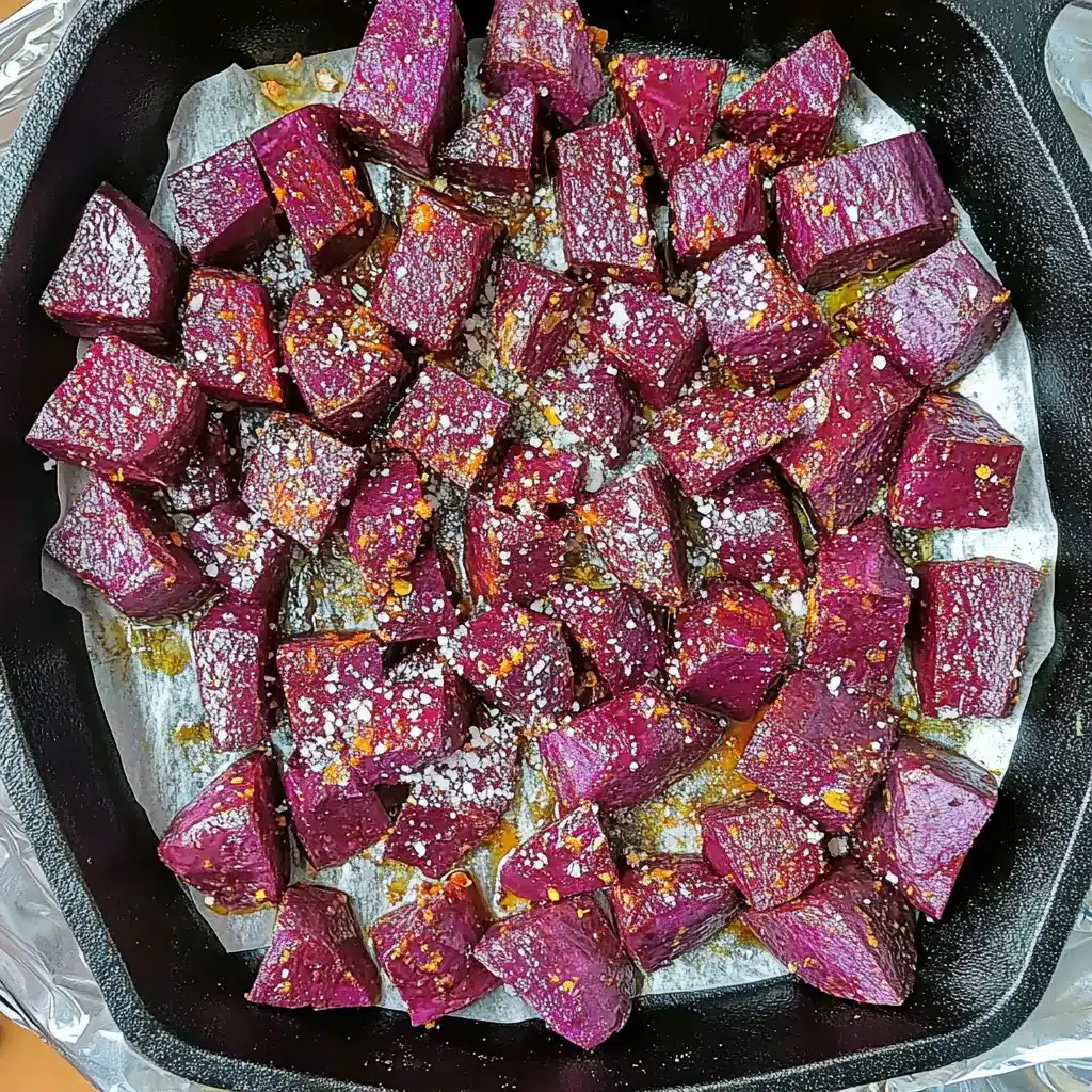 Roasted purple sweet potatoes in a cast iron skillet