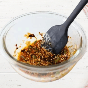 spicy cucumber salad combine dressing ingredients.